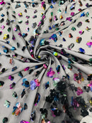 3D Holographic Rainbow Fabric - 3D Rainbow Foil Flowers on Solid Black Mesh Sold By Yard