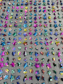 3D Holographic Rainbow Fabric - 3D Rainbow Foil Stars on Solid Black Mesh Sold By Yard